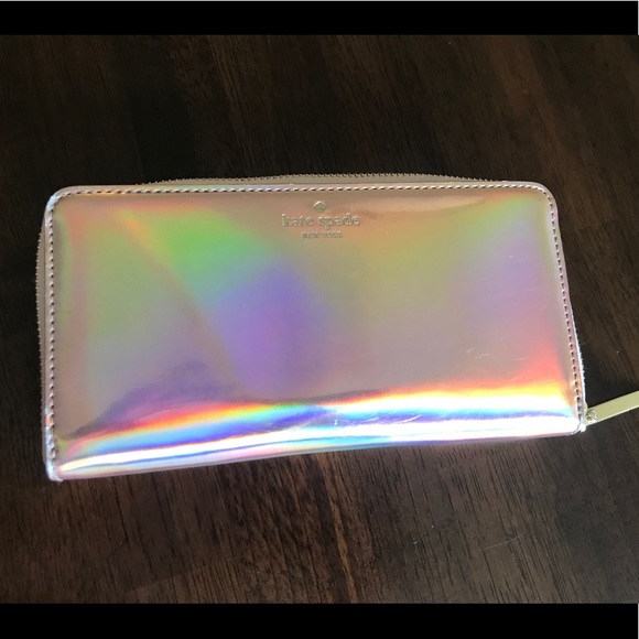 kate spade Handbags - Kate Spade rose gold wallet